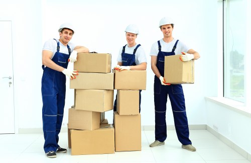 Loading household furniture into a moving van in Kings Cross