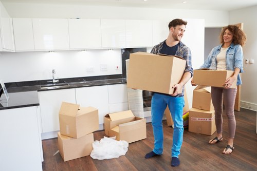 A moving van and packed boxes in the Kings Cross area