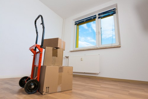 Home removals boxes and furniture in a Kings Cross flat