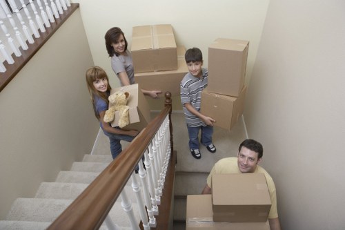 Safety-focused moving scene with clear access and PPE use